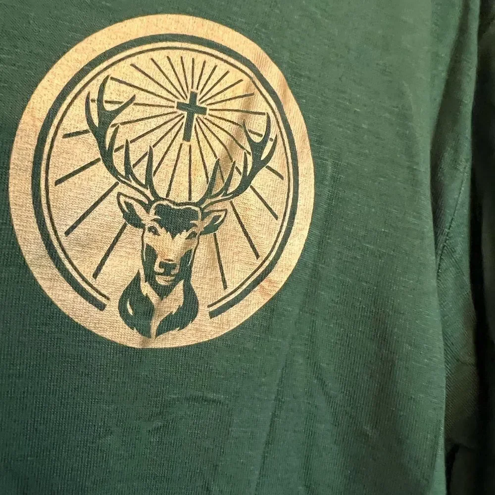 Women’s distressed cut out super soft Jäegermeister dri-fit T-shirt. Size Med.